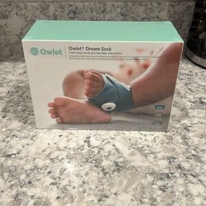 Brand new still in the plastic Owlet Dream Sock.